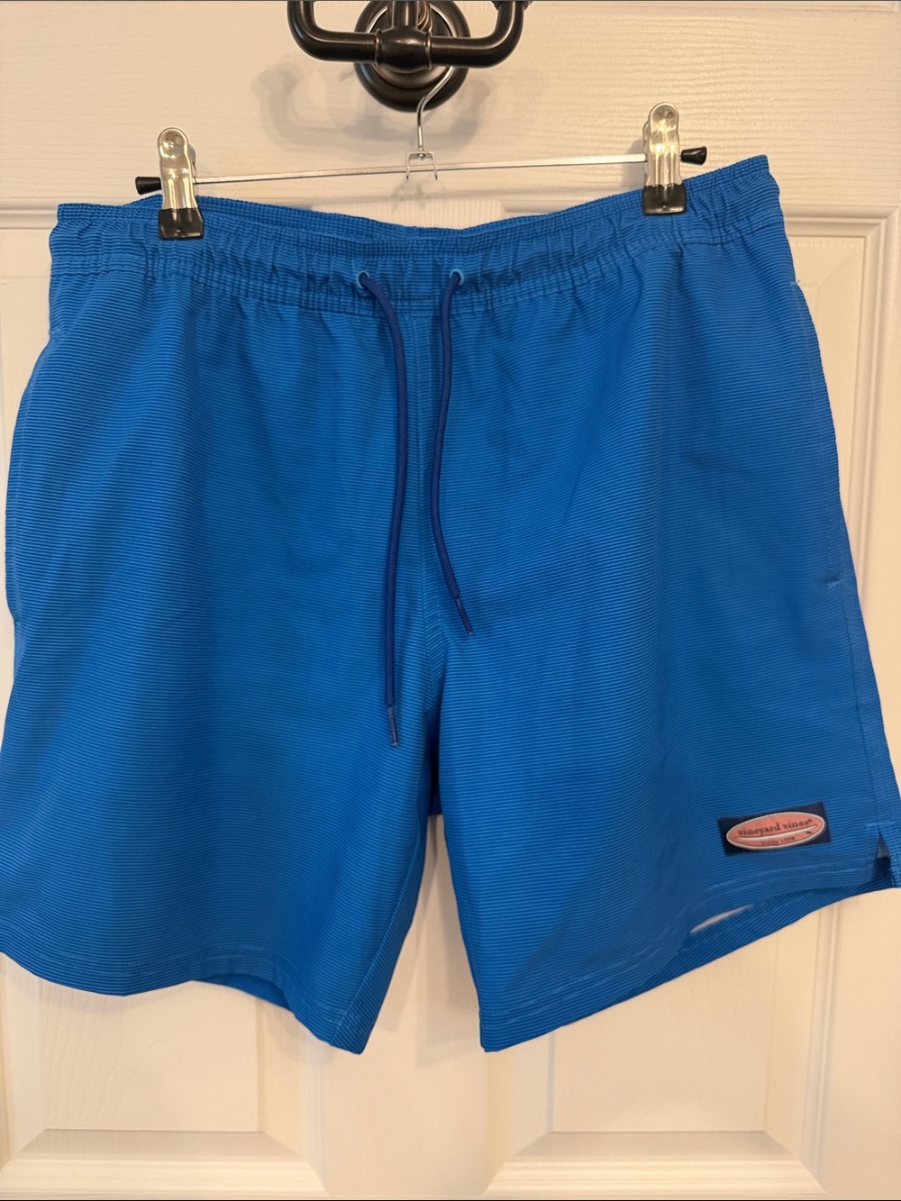 Vineyard Vines 7 inch chappy swim trunks. Size Small. Dark blue stripe design.